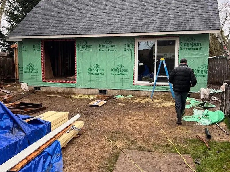 New detached ADU or garage structure wrapped in Kingspan GreenGuard weather-resistant barrier before siding installation by Red Umbrella in Eugene.